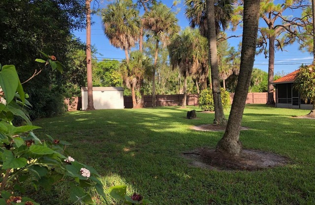 Private Sanctuary in the Heart of Royal Palm Beach..