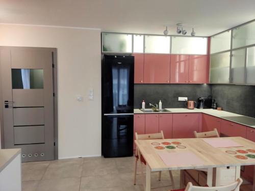 Przestronny apartament w Sosnowcu, miejsce parkingowe w hali garażowej