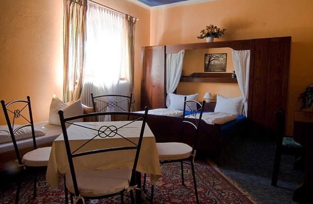 Quadruple Room with Shower and Toilet - Bed & Breakfast in Kippenheim R. Müller