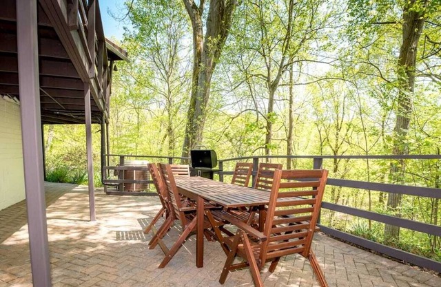 Quaint House with Patio, situated on a cliff overlooking the woods