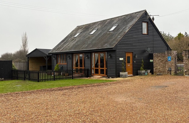 Quiet setting with secure gated parking, children's play area & farm animals