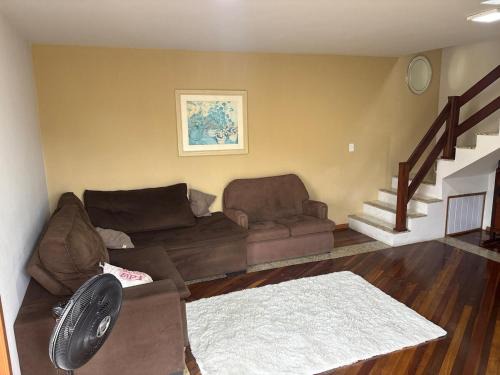 Refúgio familiar bem Perto da praia e do centro com Pátio grande e churrasqueira