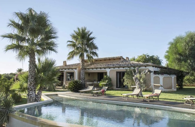 Refined villa embellished by a large green park