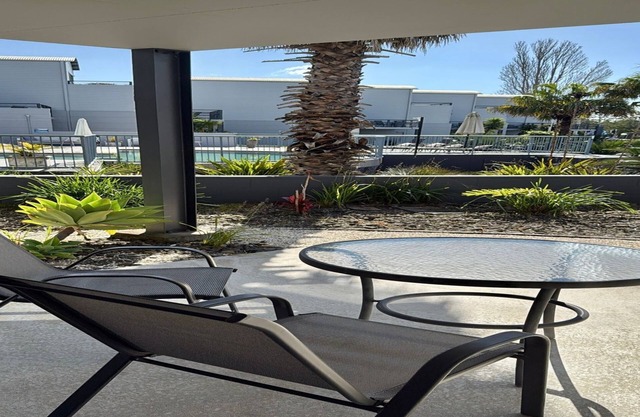 Relax by the Pool in This Stylish Batehaven Stay