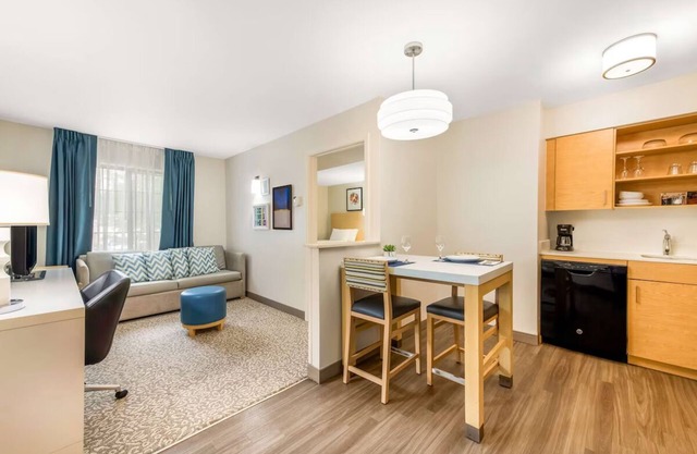 Relax in 4 Family Suites Near Attractions Like NASCAR Hall for Extended Stays