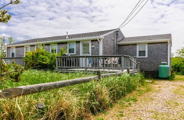 Renovated 2 bedroom right side of a duplex home with beach across the street