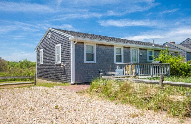 Renovated 2 bedroom left side of a duplex home with beach across the street
