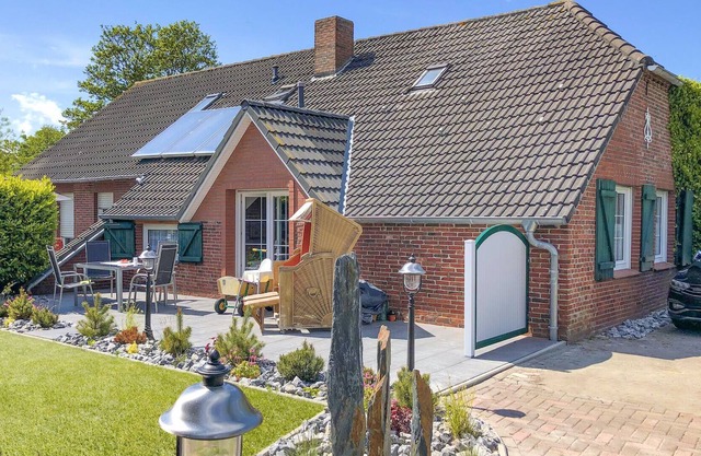 Renovated Friesian cottage with a fireplace on a lovely property