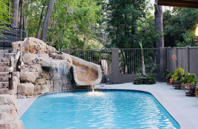 Resort style luxury home with pool (not heated) and water slide