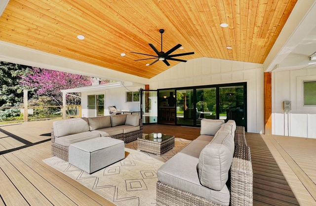 River and mountain view home with expansive deck, private pool