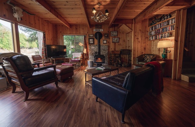 Riverside Mid-Century Cabin with Mountain Views