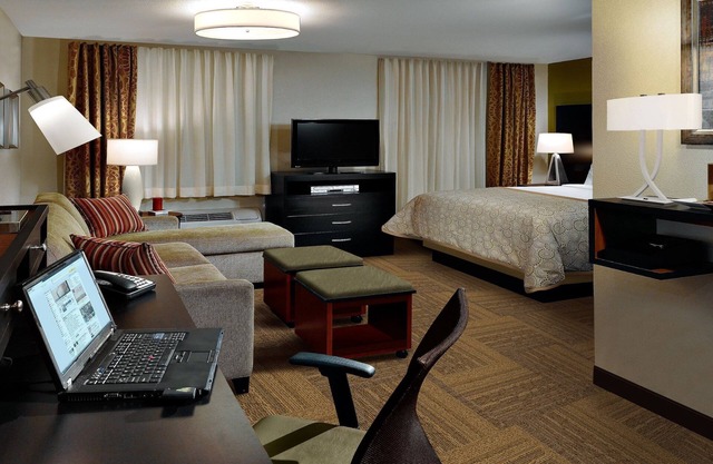 Roll-in Shower | Indoor Pool, Hot Tub, Free Wi-Fi, Free Breakfast