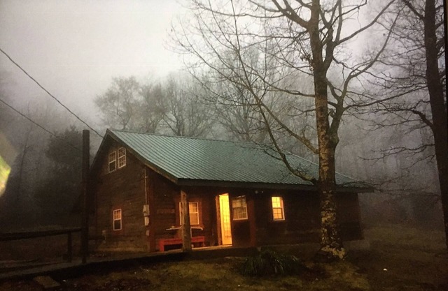 Rustic log cabin in the woods with great sunset views