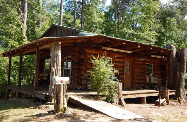 Rustic Log Cabin with fishing.