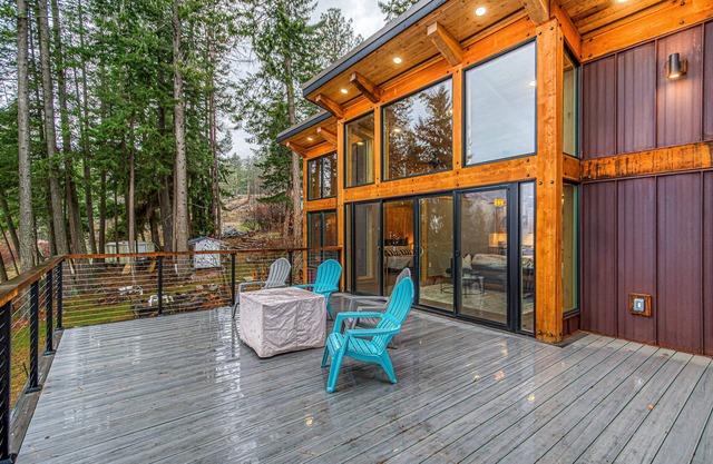 Scenic home with two entrances, mountain & lake views, fireplace, grill & W/D