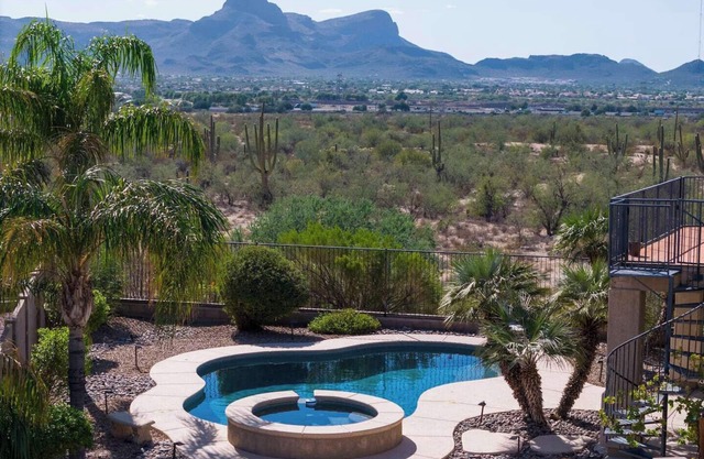 Serene desert escape with stunning mountain views, and private heated pool/spa.
