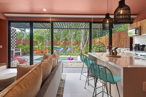 Shes moody TULUM 3 bed penthouse with yard pools rooftop aircon 15 minute drive to the beach