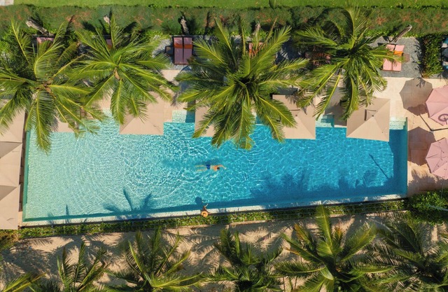 Signature By M Village Beachfront Hotel