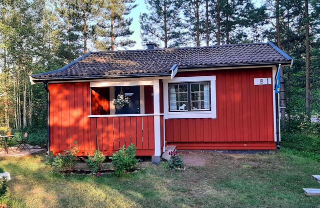 Small Dala hut on a natural plot