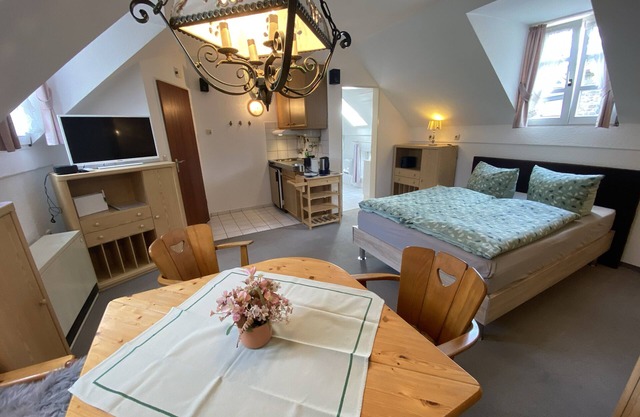 Small top floor apartment in a listed stone house in Eifel /Aachen