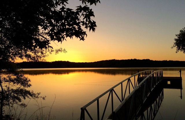 Solar powered cottage at lake, with dock, on private 300 acre timber preserve