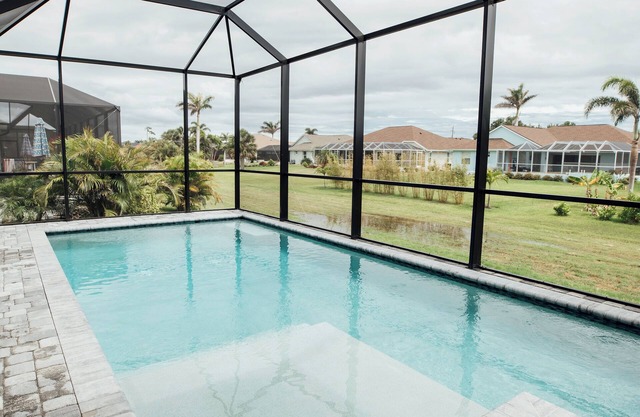 Spacious 4BR Escape with Heated Saltwater Pool & Hot Tub – Near Beaches & Golf