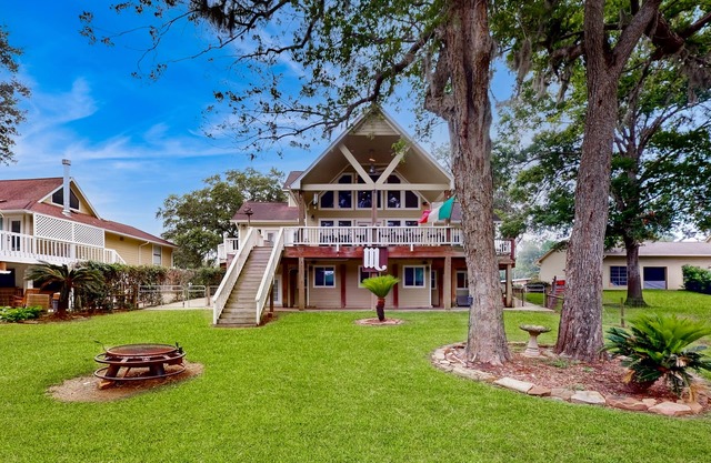 Spacious dog-friendly riverfront home with central AC, private pier + firepit