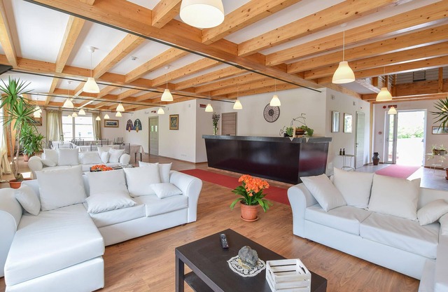 Spacious, modern vacation home with panoramic views of the mountainous landscape.