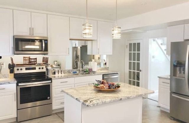 Spacious, Modern, Three Bedroom Townhome with Private Backyard