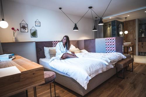 Sport & Wellness Hotel Das Falkenstein - Natural Swimming Lake - Matrix GYM - Summercard inklusive - Authentic experience - Flying wellness with Pool