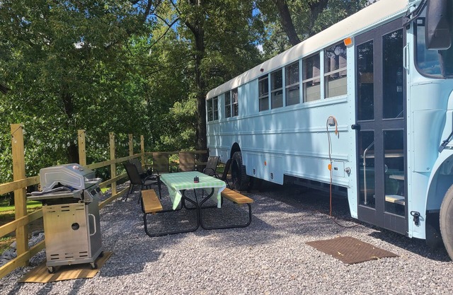 Stationary renovated local school bus. Inquire about our hunter specials!