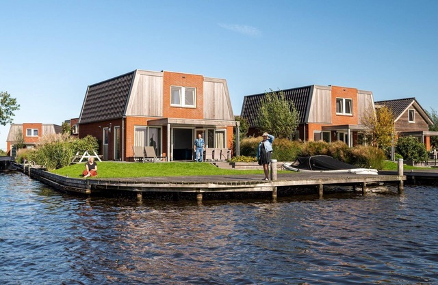 Stay in our spacious Sneekermeer 8 home with private jetty.
