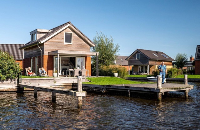 Stay in our spacious Sneekermeer 4 home with private jetty.