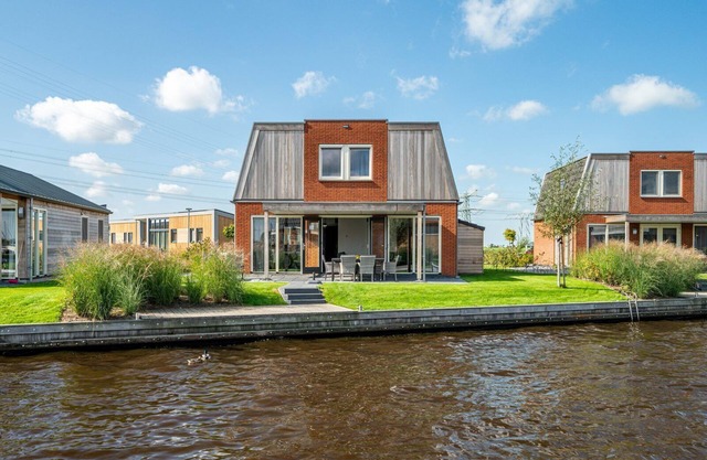 Stay in our spacious Sneekermeer 6 home with private jetty.