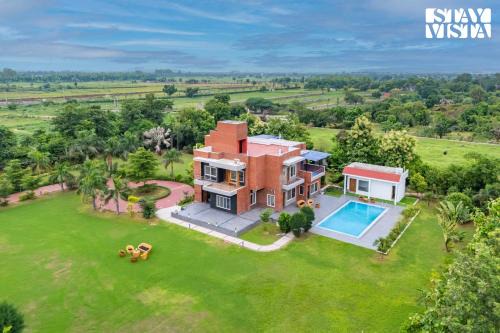 StayVista at Imperial Isle 4BHK Luxury Pool Villa in Sohna Delhi