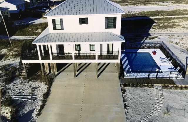 Steps away from the beach, POOL- shared between 3 houses-