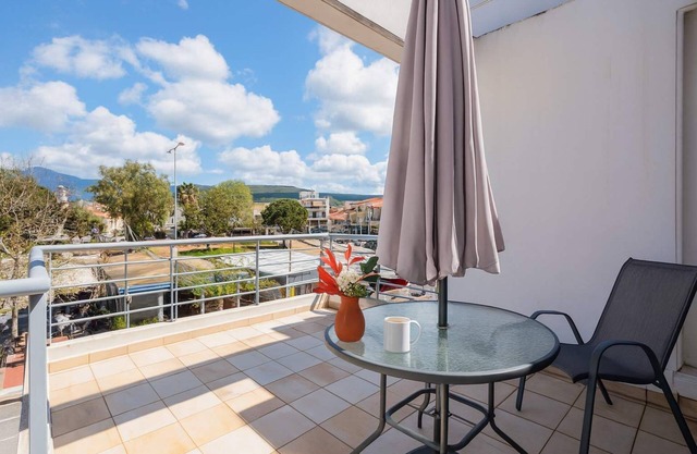 Studio with Balcony Steps from Filiatra Square