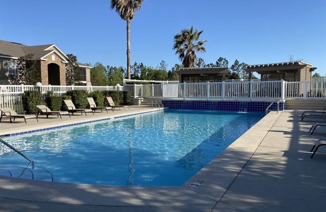 Stunning 3BR, 2BA luxury retreat with pool view, just 7 miles from the beach!