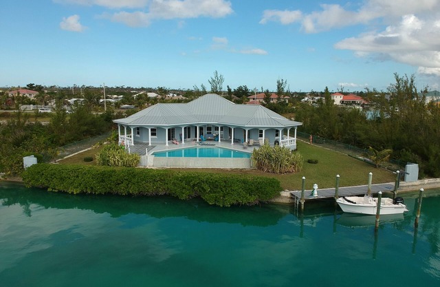 Stunning Freeport Grand Bahama Villa on Canal, with Infinity Pool & 40 ft dock