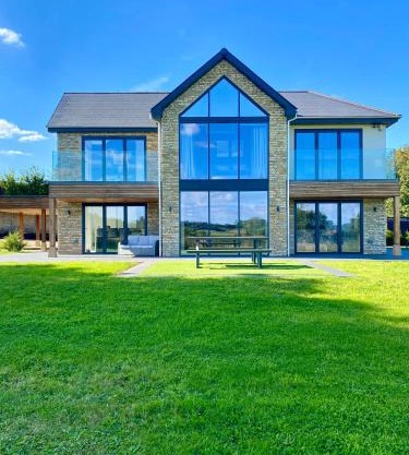 Stunning modern home set in beautiful grounds.