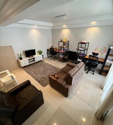 Suíte do anfitrião com ar, cama king wifi no Refúgio Raízes