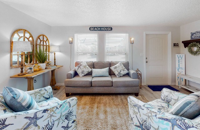 Sunny canal front home with a pool & dock - central location and dogs ok