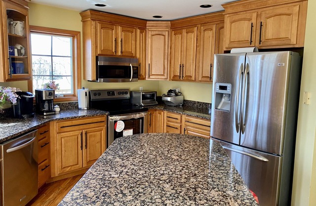 Sunny home sitting among the beautiful woods in Hyde Park, NY.