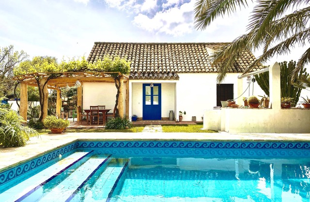 Traditional Spanish house with private pool near the beach.