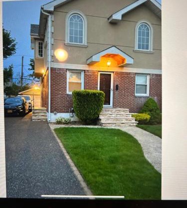 T Two Bedrooms House with Private Entrance, One block walk to UBS Arena!