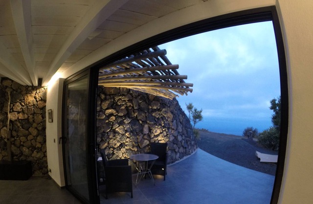 The Bodeguita house on a volcano with a guitar