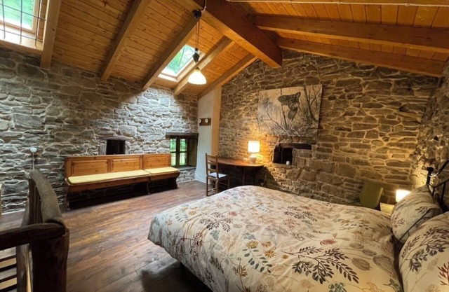 The house in the woods, rustic stone cabin nestled in the chestnut forest