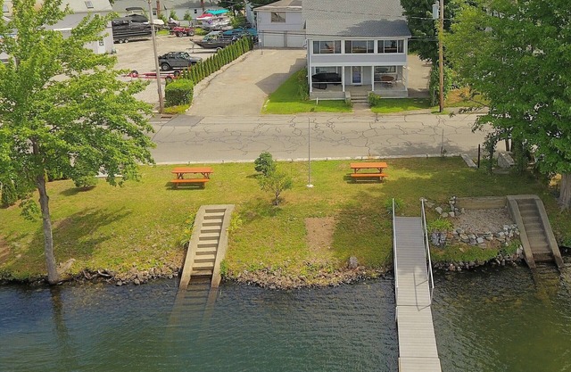 The Inn at Highland Lake, 2nd Floor, waterfront yard with a boat dock