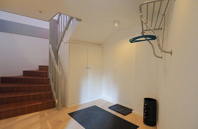 The location is heavenly quiet on the outskirts of the city, surrounded by green trees.