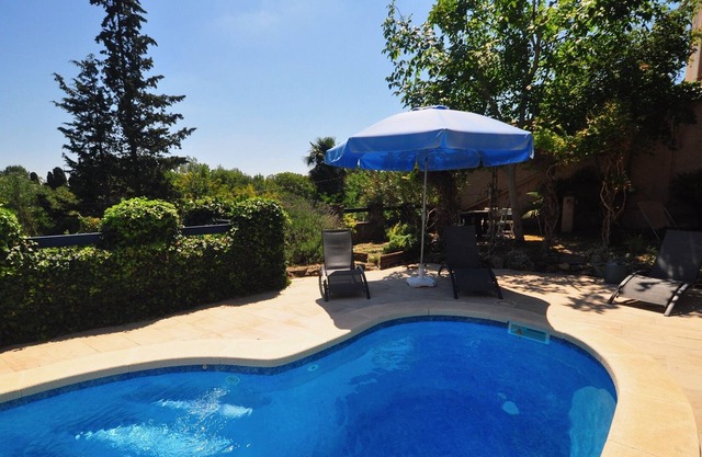 The Old Post Office, nestled in the hills with a private pool.